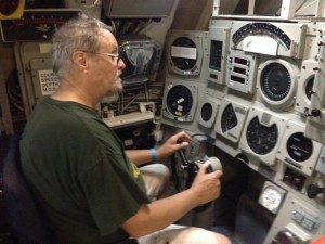 Patrick at the helm of the Dolphin