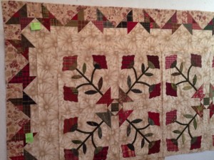 Spectacular basket-bordered applique quilt