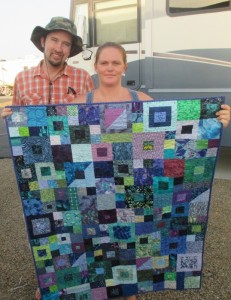 Mike & Kristen with William's quilt