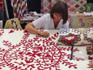 Carol quilting on the frame